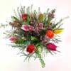Frühlingssonne mit Herz in Vase– bunter Blumenstrauß mit Tulpen und Wachskraut | Flowerpower Graz